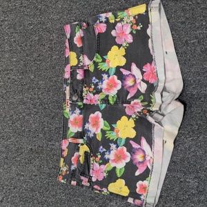 Black pink yellow tropical flower lei ashley low rise jean shorts distressed hem